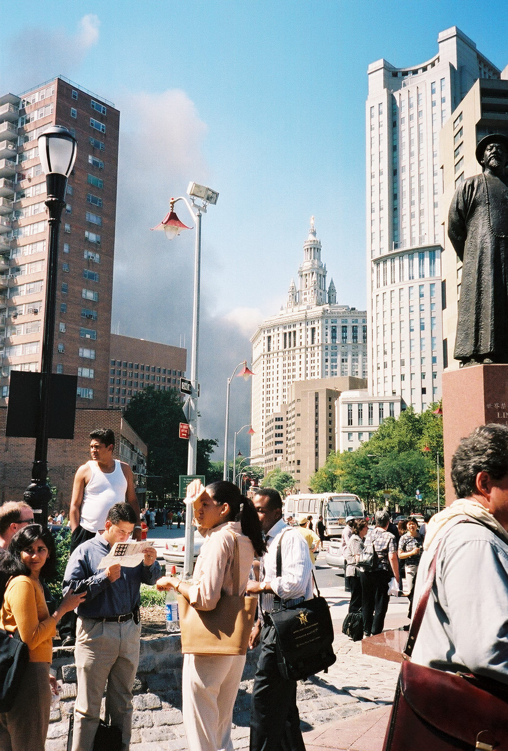 Walking east toward the Manhattan Bridge with the crowd.