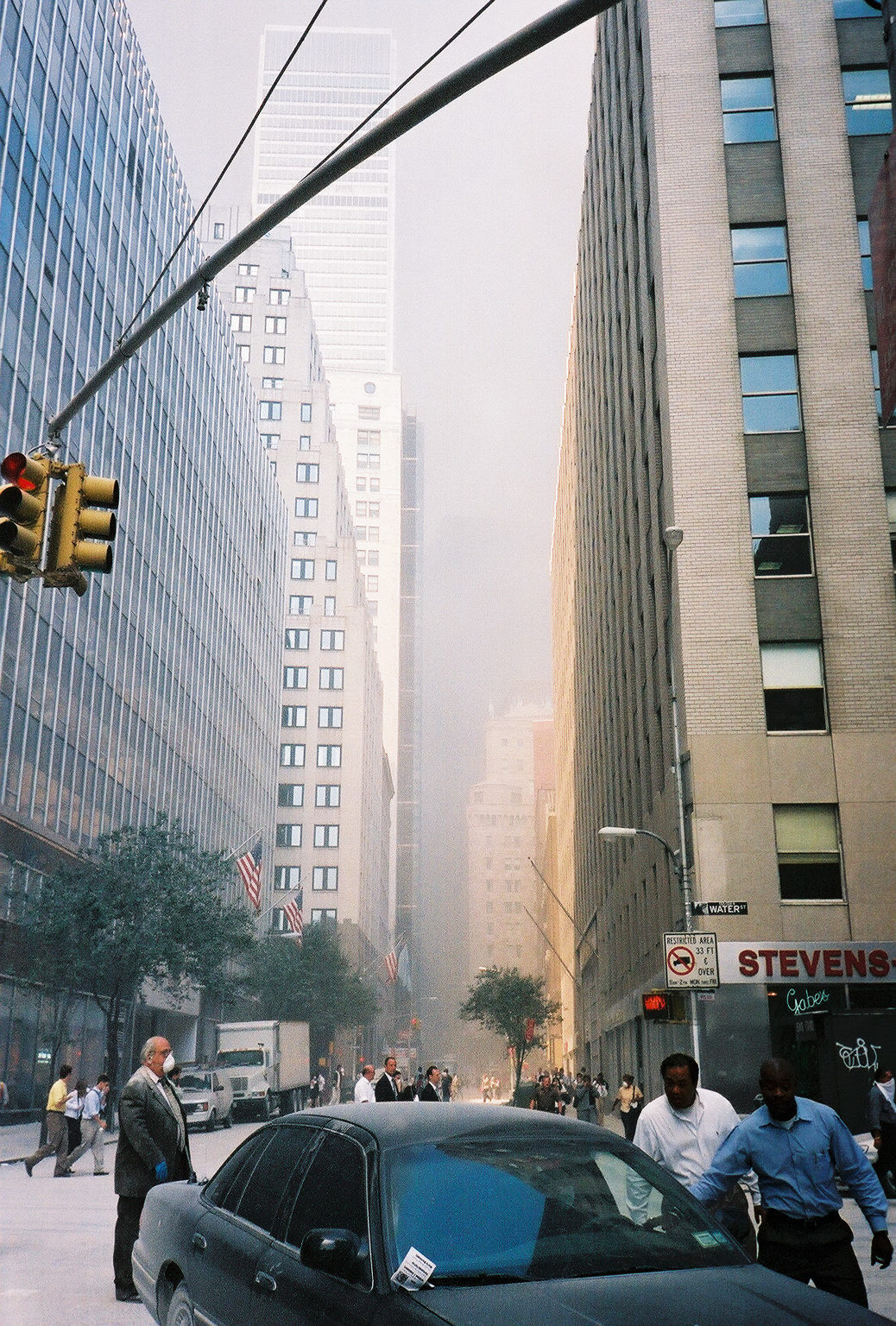 Walking east with the crowd toward the Manhattan Bridge; all mass transit stopped.